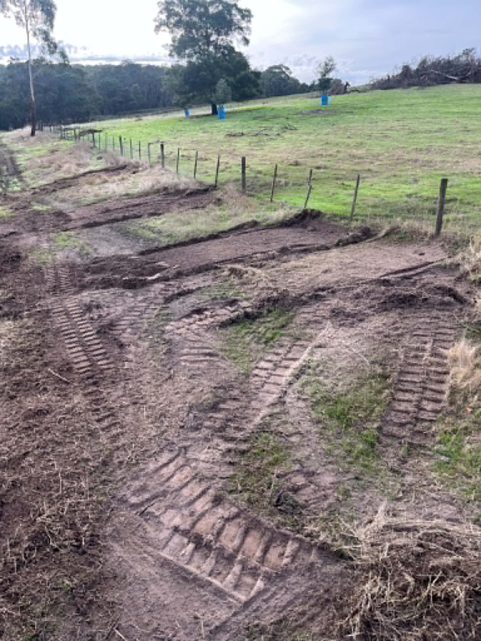 Wide view of cleared fence line after stump removal — Bambra, Colac Otway Shire